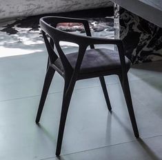 a chair that is sitting in front of a table