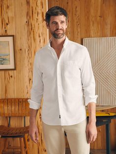 Our exclusive take on this everyday staple features Supima cotton yarns and a bit of stretch to enhance comfort and wearability — ultimately making it one of the most versatile shirts you’ll own. With a midweight weave that's airy and not too stiff, it's ideal for the office, dinner, or any other occasion that calls for a little polish. Fit: Relaxed through the chest with a slight taper at the waist. Relaxed, tapered sleeves. Detail: Button-down collar. Button front and cuffs. Chest patch pocket. Shirttail hem. Woven "Sun & Wave" label at under placket Material: 71% Supima® Cotton, 25% LENZING™ TENCEL™ Lyocell; 4% Elastane; Faux Shell Buttons Model: Paul is 6’3 wearing size Medium Care: Turn inside out. Machine wash cold with like colors. Gentle cycle. Do not bleach. Tumble dry low. Remove Oxford Shirt Men, Tall Men Clothing, Dress Shirts For Women, Supima Cotton, Sweater Sale, Oxford Shirt, Tall Guys, Shirt Sale, Men Short Sleeve