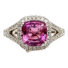 Check out this gorgeous 18k white gold ring set with a natural pink sapphire weighing 2.55 ct. Surrounding the pink sapphire are 78 round cut diamonds that weigh a total of 0.63 ct. The diamonds are G/H in color and VS2/SI1 in clarity. This ring is a beautiful addition to any wardrobe. Pink Sapphire Diamond Ring, Sapphire Cocktail Ring, Sapphire And Diamond Ring, Gold Cocktail Ring, Gold Ring Sets, Sapphire Diamond Ring, White Gold Ring, Gorgeous Jewelry, Sapphire Diamond