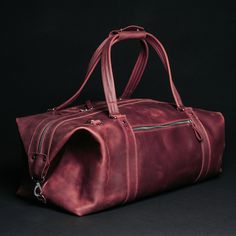 A travel bag is an element of the wardrobe of men and women who go on business trips, short-term vacations, short weekend trips. The Stout bag will store all your clothes and perfectly complement your look. This leather travel bag impresses with its appearance thanks to the natural material and metal fittings: Spacious and functional, roomy. With a large volume of 34 liters, you will find a place for everything you need to take with you: clothes, shoes, cosmetics, appliances, personal care produ Leather Lined Tote Bag For Overnight Trips, Soft Leather Rectangular Luggage For Travel, Classic Travel Duffle Shoulder Bag, Rectangular Leather Lined Duffle Bag For Overnight Trips, Classic Shoulder Duffle Bag For Travel, Rectangular Leather-lined Duffle Bag For Overnight Trips, Rectangular Duffle Bag With Leather Lining For Overnight Trips, Travel Burgundy Satchel Shoulder Bag, Rectangular Soft Leather Luggage For Travel