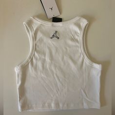 New With Tags, Never Worn. Megan Thee Stallion Collection/Collab. Women’s Size Small Jordan By Nike Top. White Fitted Top For Streetwear, Fitted White Tops For Streetwear, Nike Sleeveless Streetwear Tops, Nike Sleeveless Tops For Streetwear, Trendy Fitted Nike Tops, Nike White Tops For Summer, Basic White Nike Top, White Casual Nike Tank Top, Casual White Nike Tank Top