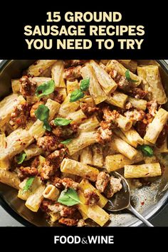 a bowl filled with pasta and meat on top of a table