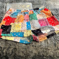 Brand New. Never Worn. Boho Paisley Print Drawstring Shorts. Casual Shorts For Spring & Summer. Women’s Shorts. Waist 31.5”. Hip Size 45.7”. Bottom Length 13.4”. Inseam Length 2.6”. Bundle With Other Items For Discount. Please Follow Me & Take A Look At My Other Listings. Thank You Tropical Multicolor Bottoms With Built-in Shorts, Summer Tie-dye Cotton Shorts, Cotton Paisley Print Shorts, Cotton Character Print Shorts, Tie-dye Cotton Shorts, Boho Paisley, Spring Shorts, Shorts Casual, Please Follow Me