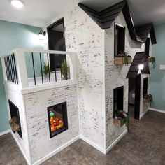 a house made out of cardboard and painted white