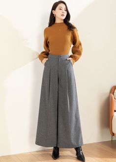 "★★ Welcome to Ylistyle Handmade shop ★★ FEATURES Wool blend, fiber, nylon Polyester lining Side pockets Front zipper and button closure Regular fit Ankle length The belt is not sale item Perfect for winter, spring, autumn Dry clean ★★ The model's height approx 170 cm (5′ 7″) with the 84 cm (33\") bust, 66 cm (26\") waist. She is wearing in the size XS. ★★ Get your size in Size Chart with your body measurement https://www.etsy.com/listing/794055682 ★★ Warmly Note: 1 ) : Loose hips design will sh Non-stretch Wide-leg Pants For Fall, Loosely Fitted Full-length Winter Pants, Baggy Wide Leg Work Pants For Fall, Winter High-waisted Wide Leg Pants With Pockets, Winter Wide-leg Pants, Non-stretch Wide Leg Pants For Winter, High Waist Non-stretch Winter Pants, Winter Workwear Baggy Pants, Baggy Winter Workwear Pants