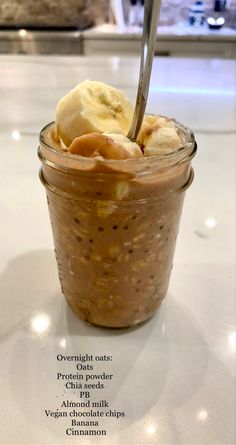 a jar filled with food sitting on top of a table