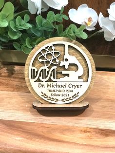 "This personalized 3D plaques/ornament would be the perfect gift for your favorite Scientists, teachers, students, coworkers. We offer 3 styles: ---- one layered ornament (style3) ----two layered ornament: Style 1-the backer is 3.5\" and the pattern is 3.2\" Style 2-the backer and the pattern are equal with the 3.5\" diameter. The backer will be stained in dark walnut. You can choose the gift box or an organza bag. Our 3D name plaque would be the perfect gift for graduate students in science. Th Dna Ornaments Diy, Biology Ornaments Diy, Science Themed Ornaments Diy, Science Ornaments, Science Christmas Ornaments, Biology Ornaments, Science Microscope, Dna Science, Star Science