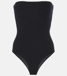 Strapless bustier bodysuit in black - Alaia | Mytheresa High Cut Nylon Bodysuit With Built-in Bra, Chic Fitted Bodysuit With Spaghetti Straps, Elegant High Stretch Bodysuit With Built-in Bra, Chic Spaghetti Straps Lined Bodysuit, Chic Bodysuit With Spaghetti Straps And Lined Body, Party Bodysuit With Spaghetti Straps And Seamless Design, Seamless Party Bodysuit With Spaghetti Straps, Elegant Nylon Bodysuit For Night Out, Chic Fitted Nylon Bodysuit