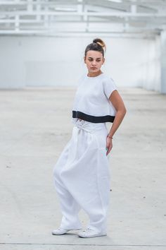 "White Harem Pants, Linen Maxi Pants, Wide Leg Pants ◈ Stylish and chic fashion is our shared dream! You can be sure that this piece is made with a lot of love and craftsmanship. ◈ S I Z I N G ◈ This item is available from XS to 4XL. Please, have a look at my Size Chart below before placing your order. ◈ D E L I V E R Y ◈ This item will be shipped in up to 5 days after your order was placed. We use Express worldwide shipping for all of our items. Shipping usually takes: ✈ 2-3 biz days to USA, Ca Fitted White Harem Pants With Pockets, White Baggy High Waist Harem Pants, White High Waist Baggy Harem Pants, White Baggy Wide-leg Harem Pants, High Waist White Harem Pants With Pockets, White Wide-leg Parachute Pants, White Parachute Pants With Loosely Fitted Hips, White Wide Leg Parachute Pants For Summer, White Baggy Parachute Pants For Summer