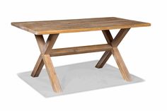 a wooden table sitting on top of a white floor