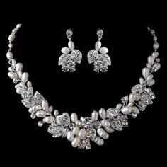 a necklace and earring set with pearls