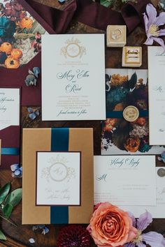 the wedding stationery is laid out and ready for guests