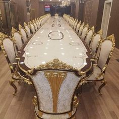 a long table with many chairs around it