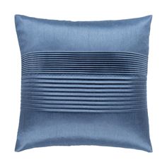 a blue pillow with pleated lines on it