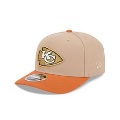 The Kansas City Chiefs Sandy Rust 9SEVENTY Adjustable Hat features an embroidered Chiefs logo at the front panels with a matching wordmark at the right-wear side. Additional details include a snapback closure at the rear and a green undervisor. College Snapback Hat With Embroidered Logo And Curved Bill, Curved Brim Snapback Hat With Embroidered Logo For College, Game Day Embroidered Logo Snapback Dad Hat, Game Day Snapback Dad Hat With Embroidered Logo, Embroidered Logo Snapback Dad Hat For Game Day, Throwback Adjustable Baseball Cap With Embroidered Logo, Urban Trucker Hat With Embroidered Logo And Flat Brim, College Snapback Baseball Cap With Embroidered Logo, Collegiate Fitted Baseball Cap With Logo Patch