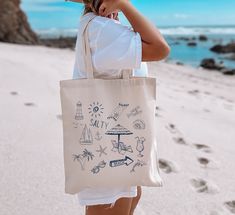 Carry your favorite gear in this heavy canvas beach bag. Coastal Beachy Vacation Tote Bag, Bridal Party Womens Carryall Large This 100% cotton bag is perfect for everyday use. The canvas material is durable and will last for years. The bag features 20" handles (made from the same canvas), making it easy to carry large loads. * 100% cotton canvas * Heavy fabric (12 oz/yd² (406.9 g/m * Machine washable (cold) * Durable & reusable - carry 10-15 lbs (4-7 kg) easily  * Reinforced stitching on handles Summer Cotton Canvas Bag For Beach Season, Cotton Bags For Weekend Trips In Summer, Cotton Bags For Weekend Trips During Summer, Cotton Canvas Tote Bag For Weekend Trips, Cotton Canvas Bag For Daily Use And Beach Season, Casual Cotton Beach Bag For Vacation, Cotton Canvas Bag For Beach Vacation, Cotton Beach Bag For Travel And Vacation, Cotton Beach Bag For Everyday Use On Vacation