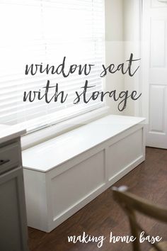 a window seat with storage underneath it