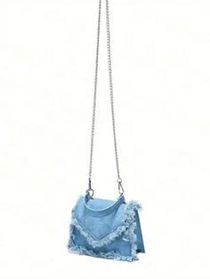 This crossbody bag features a chic denim effect tie dye design, paired with fringe detail and a metal chain strap. The perfect combination of style and functionality, this bag is sure to elevate any outfit. Stay on-trend and hands-free with this must-have accessory. Color : Blue Details : Raw Hem, Tassel Magnetic : Yes Type : Square Bag Bag Size : Mini Strap Type : Chain Pattern Type : Plain Closure Type : Magnet Style : Funky, Fashionable Features : Lightweight Coating : 100% Polyurethane Compo Stylish Camera Bags, Storage Outdoor, Cosmetics Storage, Denim Handbags, Stylish Couple, Chain Pattern, Denim Chic, Novelty Bags, Tie Dye Designs