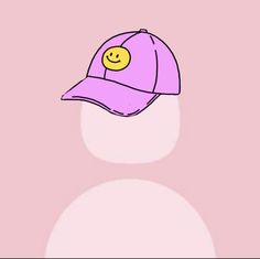 a baseball cap with a smiley face on it's visor is shown against a pink background