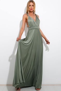 Flowing maxi dress.
Thick straps.
Straps can be tied in multiple ways.
Stretch elastic at back.
Thick, soft fabric.
Skirt flows freely and drapes from the body.
Not lined.
Polyester. Green Backless Bridesmaid Maxi Dress, Green Backless Maxi Dress For Bridesmaid, Summer Maxi Dress With Adjustable Straps And Stretch, Bridesmaid Maxi Dress With Tie Back, Summer Stretch Maxi Dress With Adjustable Straps, Stretch Maxi Dress With Adjustable Straps For Summer, Evening Maxi Dress With Knotted Straps, Stretch Maxi Length Backless Dress With Tie Back, Black Stretch Maxi Dress With Spaghetti Straps