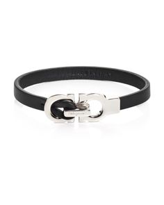 Salvatore Ferragamo Double Gancini Leather Bracelet Designer Formal Jewelry With Metal Logo, Timeless Leather Bracelet For Formal Occasions, Luxury Leather Bracelets For Business, Designer Leather Bracelet For Formal Occasions, Luxury Leather Jewelry With Logo Charm, Luxury Leather Business Jewelry, Luxury Leather Strap Bracelets, Luxury Leather Strap Bracelets For Business, Designer Leather Bracelet