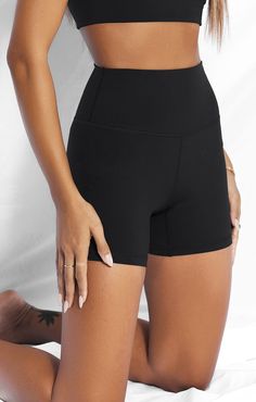 You won't want to take these off... Experience the Sculpt™ effect. Built from your favourite premium smoothing & lifting blend, these seamless 5" bike shorts are a staple in your active and leisure wardrobe. Pair with matching Sculpt™ and Sweat™ essentials for the ultimate effortless, everyday look. 75% polyester | 25% spandex Butter, second skin feeling Wide, doubled waist band with flattering 'V' shaping at back Black 3D rubberised logo printed on back Size S inseam length = 5 inch with 0.5cm Breathable Black Biker Shorts For Yoga, Black Squat Proof Biker Shorts For Gym, Black Breathable Athletic Shorts For Yoga, Solid Above Knee Athletic Shorts For Workout, Solid Color Squat Proof Biker Shorts For Athleisure, Sweat Resistant Athleisure Shorts, Moisture-wicking Solid Color Above-knee Shorts, Solid Color Above Knee Athletic Shorts For Workout, Black Sweat Resistant Biker Shorts For Yoga