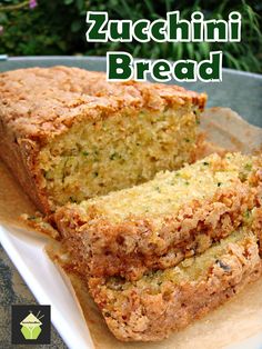 two slices of zucchini bread sitting on top of a white plate with text overlay