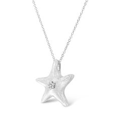 Beguile her with starbursts of light-reflecting beauty of this gorgeous diamond star fish pendant crafted in sterling silver. The center of the star fish is adorn with a cluster of 7 prong set shimmering single cut diamonds. This dainty pendant hangs from a cable chain. Total diamond weight is 1/30 ctw. Elegant Sterling Silver Jewelry With Starfish Charm, Sterling Silver Star Necklace With Diamond Accents, Elegant Silver Starfish Jewelry, Elegant Star-shaped Necklace With Starfish Charm, Elegant Starfish Charm Star Necklace, Elegant Silver Starfish Necklace, Elegant Starfish Charm Necklace, Silver Starburst Jewelry With Diamond Accents, Silver Starfish Charm Pendant Jewelry