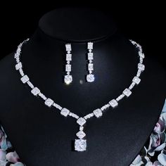 Complete your wedding look with this elegant Bridal Necklace and Earring Jewelry Set. The set is designed to add a touch of sophistication and style to your bridal ensemble, making you shine on your special day.
– This bridal a plus cubic zirconia gemstone necklace set is perfect for adding elegance to any bridal ensemble.– Made with high-quality materials, this set includes a stunning necklace and matching earrings for a complete look.– Perfect for pageant, bridal, bridesmaid, prom, quinceañer Prom Jewelry Sets, Jewelry Prom, Couture Necklace, Beautiful Tiaras, Diamond Alternatives, Cubic Zirconia Necklace, Wedding Look, Prom Jewelry, Dope Jewelry