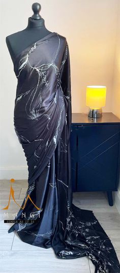 Hand-painted elegant black colour saree with bead work. Black Art Silk Saree, Black Silk Bollywood-style Saree, Black Silk Bollywood Saree, Bollywood Style Black Silk Saree, Black Silk Saree With Zari Work, Elegant Black Silk Saree, Black Pre-draped Saree With Zari Work, Elegant Black Silk Pre-draped Saree, Black Silk Pre-draped Saree For Diwali