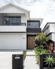 the instagram page shows an image of a house with plants in front of it