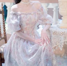 Paulina Fairycore Princess Dress is an off-the shoulder chiffon dress with accented waist, beautiful soft floral print and white appliqué flowers. Size SBust 82cmWaist 66cmLength 112cm Size MBust 86cmWaist 70cmLength 113cm Size LBust 90cmWaist 74cmLength 114cm Fairycore Floral Print Dress With Square Neck, Fairycore Floral Print Square Neck Dress, Summer Fairy Dress With Floral Print For Garden Party, Summer Floral Print Fairy Dress For Garden Party, Fairycore Chiffon Dress For Garden Party, Balletcore Floral Print Dress For Garden Party, Fairycore Short Sleeve Dress For Garden Party, White Fairycore Dresses With Floral Print, White Floral Print Fairycore Dress