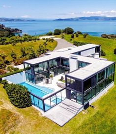 an aerial view of a house with a swimming pool