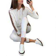 White Fashion Hoodie with Pant Set Sporty White Hooded Set, White Hooded Sets For Spring, White Loungewear Set For Fall, White Fall Loungewear Sets, White Sets For Loungewear In Fall, Sporty White Winter Sets, Trendy Tracksuit With Drawstring Hood For Fall, White Hooded Tracksuit For Fall, White Tracksuit With Drawstring Hood For Fall