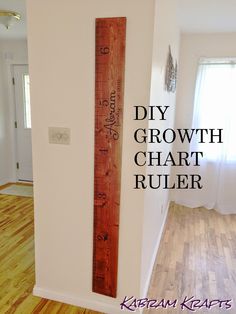 a wooden ruler with the words diy growth chart ruler written on it