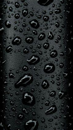 drops of water on the surface of a bottle