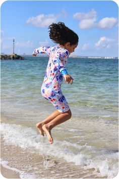 Get ready for some summer fun in the Aloha Burn Blocker Suit! The Aloha is designed to keep your little ones comfortable and protected from the sun. Pattern includes short and long sleeves and features a zip-up front for easy on/off. A full zipper shield keeps the suit comfortable on the inside, prevents chafing at the neckline and keeps the zipper pull out of reach for the little ones. Sizes 3 mos. - 4t include an optional snap inseam. Pattern comes with a full tutorial and color photos in an e Fitted Beachwear Playwear Set, White Stretch Swim Sets, Fitted Beachwear Sets For Playwear, One-piece Beach Set For Summer, Playful Fitted Sets For Vacation, Playful Long Sleeve Swimwear For Surfing, Summer Playwear Sets For Beach Season, Playful Beach Sets With Stretch, Playful Multicolor Sets For Beach Season