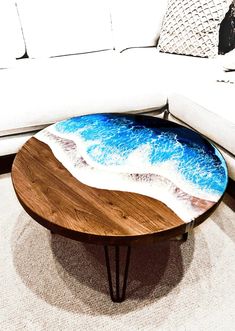 a wooden table sitting on top of a white couch