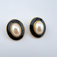 Round geometric enamel clip on earrings in black, yellow/cream, and gold tone. The enamel on the yellow part is damaged and rough. But these are still wearable! Cleaned and ready to wear. Luxury Mid-century Clip-on Earrings, 90s Earrings, Vintage Clip Earrings, Vintage Clip On Earrings, Vintage Monet, Yellow Cream, Jo Malone, Vintage Clip, Clip Earrings