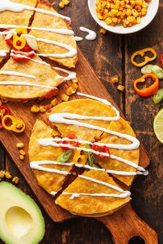 corn and sweet pepper quesadillas on a cutting board