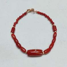 BEAUTIFUL Coral Bracelet, 100% Natural Italian Coral Bracelet, Vintage Coral Bracelet, Handmade Bracelet, Red Coral Bracelet, Gift For Her, Gemstone : Italian Red Coral  Carat Weight : 45 Cart ( 9 Gram )  Stone Dimension : Length :  20 X 4 MM Width : 9 X 4 MM Strand Length;- 7 Inches  Color : As Seen In Picture Payment policy We accept the payment via PayPal only. Shipping policy We Ship the item as per our shipping policy once we receive the payment. We understand that getting your items quickl Red Coral Bracelets As A Gift, Red Coral Bracelets For Gift, Red Hand-strung Bangle Bracelet, Coral Bracelet, Vintage Bracelet, Bracelet Vintage, Handmade Bracelet, Bracelet Handmade, Red Coral