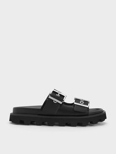 For the modern style maven who loves to go bold with her everyday accessories, these Trill slides will be a delight. Featuring a black finish and thick, buckled grommet straps, this is an elevated version of the classic sandal style. The straps are also adjustable to ensure a secure and comfortable fit for all-day wear. Cooler Aesthetic, Double Strap Sandals, Sandal Style, Brand Collaboration, Faux Leather Heels, Size Chart For Kids, Charles Keith, Everyday Accessories, Sandal Fashion