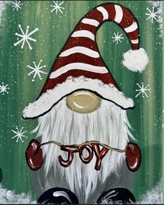 an acrylic painting of a santa clause hat with the word joy on it