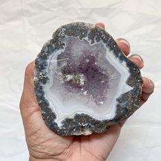 Brazilian Crystal Geode Specimen This is a small and natural crystal specimen with real crystal points and agate banding. The front of the stone has been polished for a smooth finish.  It has a natural deep "cave" that is full of clear crystal points and purple druzy.  This piece makes a great addition to your personal crystal collection and is suitable as home decor or use it as paperweight in your office. Δ   Arrives beautifully packaged, ready for gift giving.  Δ   Ready to ship within 48 hours. SHOP THE ENTIRE ROSE AND DELLA COLLECTION HERE: https://www.etsy.com/shop/ROSEandDELLA  PRODUCTION TIME  All items are in stock and ready to ship.  Please allow up to 48 hours for your order to packed and shipped.  PLEASE NOTE  When you purchase my items, you are agreeing to my shop polices.  Pl Large Agate Geode For Spiritual Purposes, Healing Agate Geode Gemstones, Large Agate Geode For Spiritual Use, Grand Prairie, Crystal Geode, Crystal Collection, Crystal Points, Natural Crystals, Clear Crystal