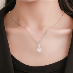 "The Infinity cremation necklace is a beautiful and elegant way to memorialize your loved one. Made of high-grade stainless steel and featuring a delicate polished sheen, it has a contemporary yet truly timeless look. The pendant has a threaded screw on the bottom which opens to a small compartment that can only hold a minimal amount of ashes. To ensure security of ashes, we recommend adding a dab of super glue to the screw enclosure after inserted the ashes into the pendant. ∞ To fill the urn n Elegant Charm Necklaces For Mother's Day Keepsake, Elegant Hypoallergenic Stainless Steel Charm Necklaces, Elegant Stainless Steel Hypoallergenic Charm Necklaces, Elegant Hypoallergenic Stainless Steel Charm Necklace, Elegant Hypoallergenic Stainless Steel Necklaces, Elegant Hypoallergenic Stainless Steel Necklace, Elegant Silver Charm Necklace For Memorials, Elegant Silver Charm Necklaces For Memorials, Elegant Silver Charm Necklaces For Memorial