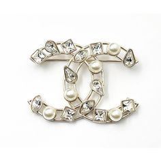 This is part of Chairish’s Costume Jewelry assortment.  Chanel Gold CC Tear Drop Princess Crystal Pearl Brooch  *Marked 19 *Made in Italy *Comes with the original box  -It is approximately 1" x 2". -It is one of the most classic Chanel brooches. -In a pristine condition Chanel Pearl Brooch, Designer Silver Brooches For Gifts, Luxury Silver Pins For Formal Occasions, Designer Silver Brooch For Anniversary, Designer Silver Brooches For Wedding, Designer Silver Wedding Brooches, Luxury White Brooch For Gift, Luxury White Brooches For Gifts, Luxury White Brooches As Gift