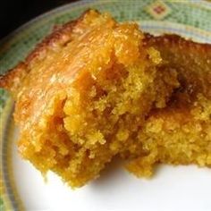 a close up of a piece of cake on a plate with a bite taken out