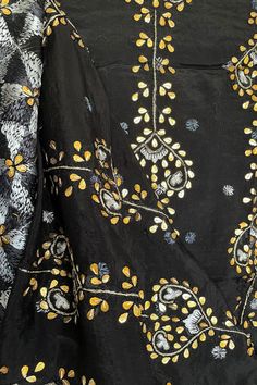 This traditional Phulkari dupatta is meticulously crafted with luxurious pure Chinon silk, featuring Gotta Patti hand embroidery. This black-hued piece is perfect for celebrations such as weddings, sangeet, jaago, and chunni ceremonies and boasts a striking metallic gold trim along the border. Effortlessly pair this dupatta with any color for an elegant contrast and make it an admirable present for birthdays or anniversaries. Material: Pure silk chinonWork: Silk thread phulkari handwork, needlework, gotta patti workPattern: FloralSize: Full Size 2.5 meters Phulkari Pants, Lucknowi Kurta, Gharara Suits, Patiala Salwar Suits, Bridal Dupatta, Phulkari Dupatta, Chikankari Suits, Gotta Patti, Work Pattern