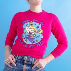 Such an iconic vintage Rugrats Sweatshirt from the 1990’sFeaturing a graphic print on the front of Angelica and the words “None for All, and All for Me!”Child’s size Large. Fits like an XS cropped sweatshirt.Excellent vintage condition, with only one tiny mark on graphic.Measurements in inches taken while lying flatBust 16-18 (with stretch)Waist 13-17 (with stretch)Length 18 Rugrats Sweatshirt, All For Me, Womens Sweatshirts, Cropped Sweatshirt, Dooney & Bourke, Vintage Coach, Crop Sweatshirt, Striped Knit, Pink Sweater