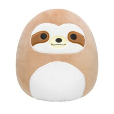 a stuffed slotty is sitting on top of a white surface and has eyes wide open